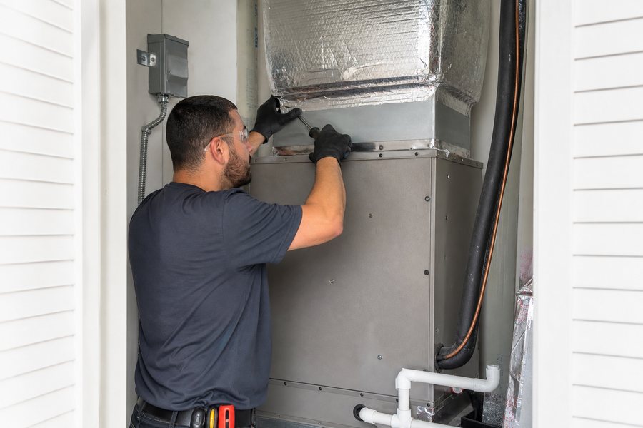 Technician connecting a residential HVAC air handler in Riverview